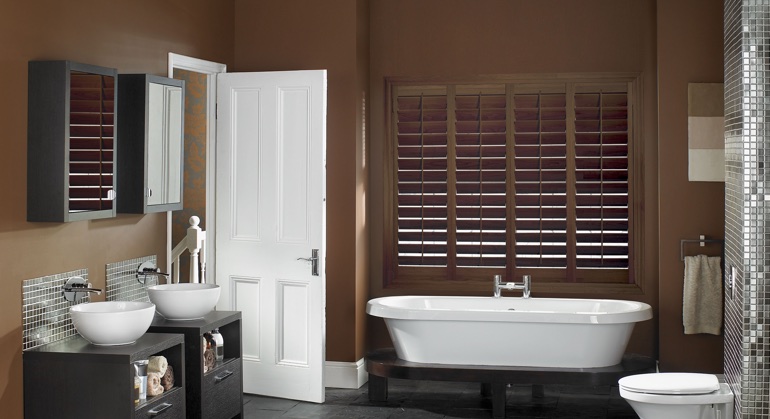 Stained wood shutter in Boston restroom